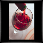 Red Wine pouring into a glass